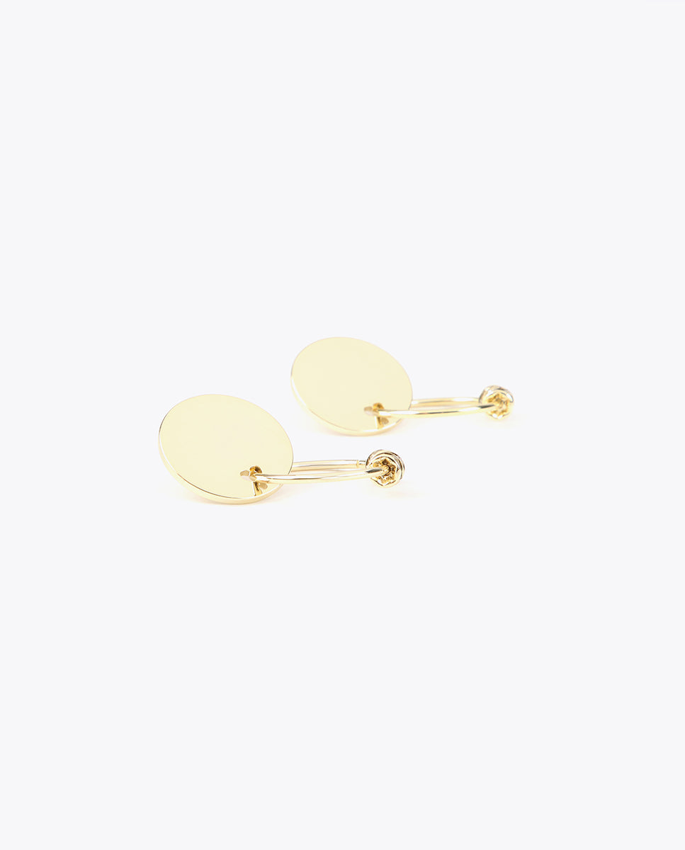 Stud and hoop earrings with charms