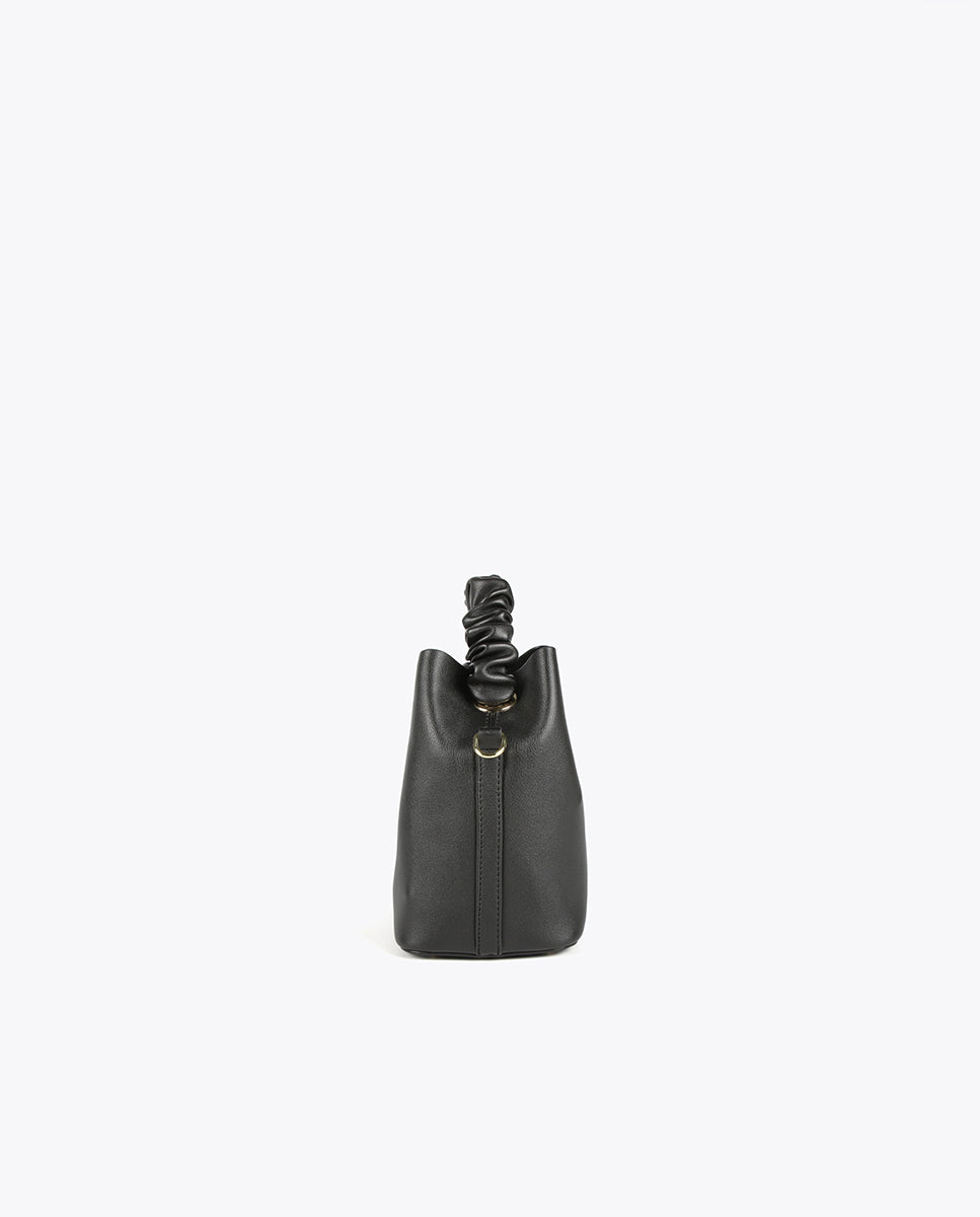 Crossbody bag with gathered strap
