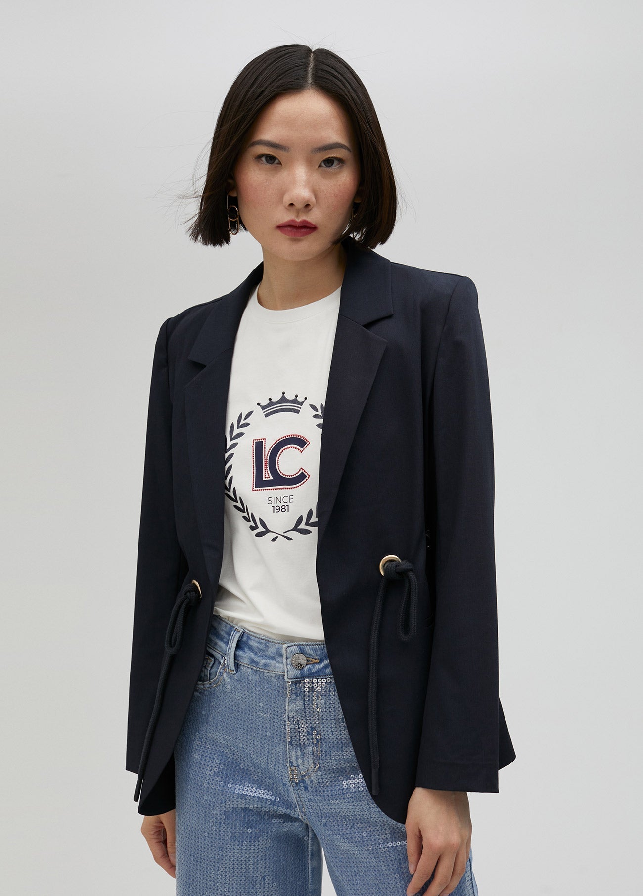 Blazer with eyelets