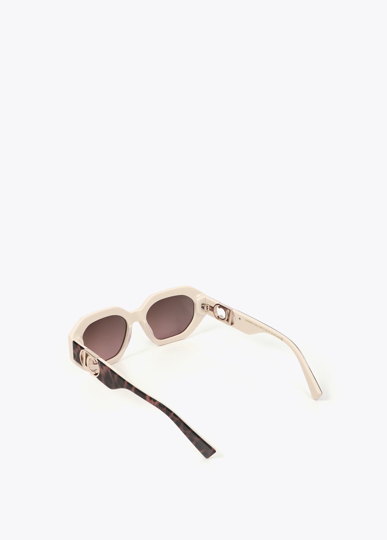 Hexagonal glasses with inner animal print made of cellulose acetate