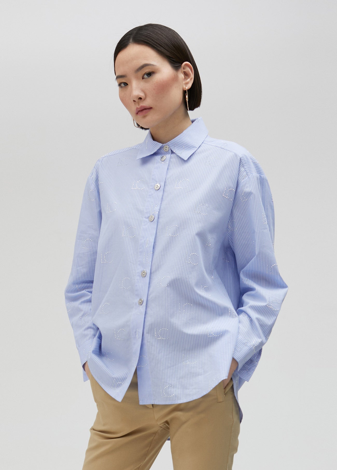 Striped shirt with rhinestone logo