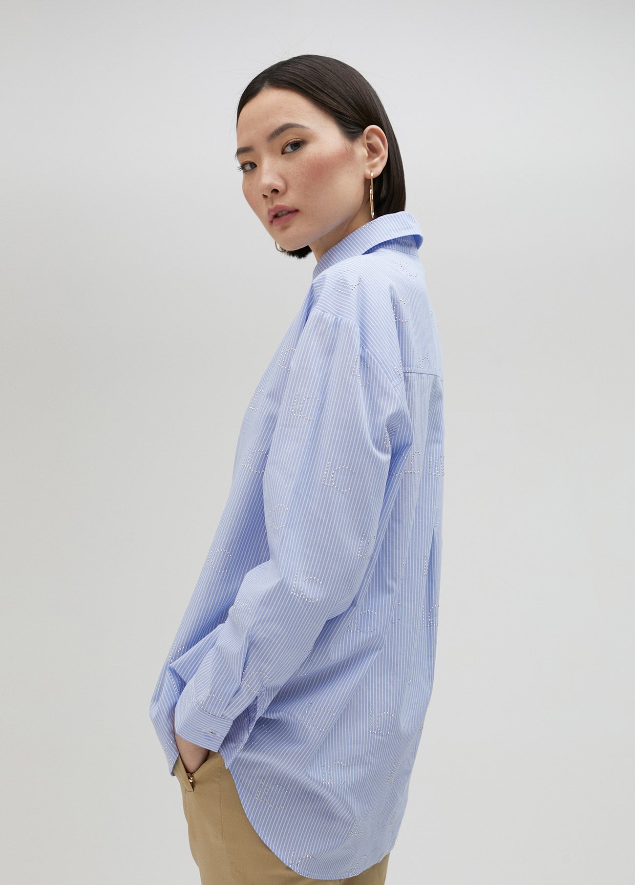 Striped shirt with rhinestone logo