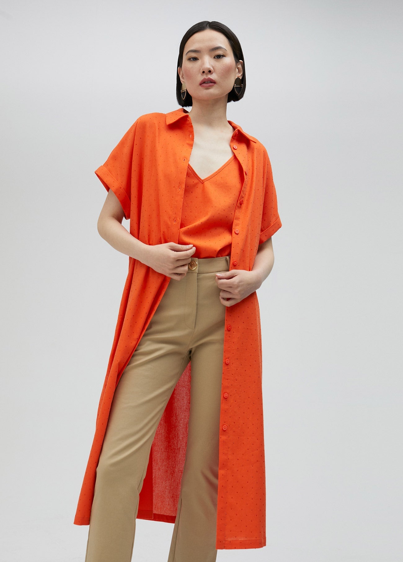 Long oversize blouse with rhinestone detail