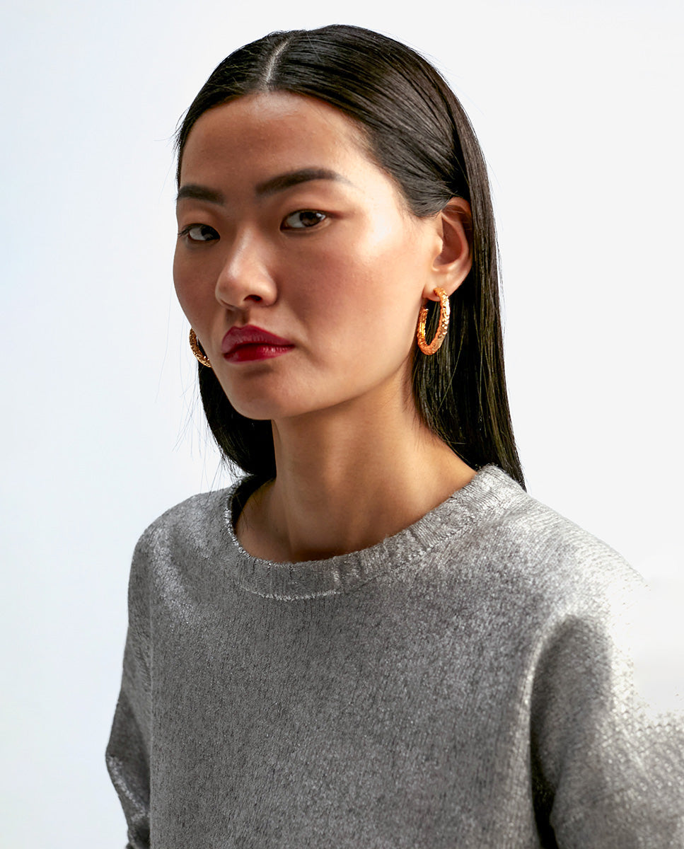 Laminated sweater
