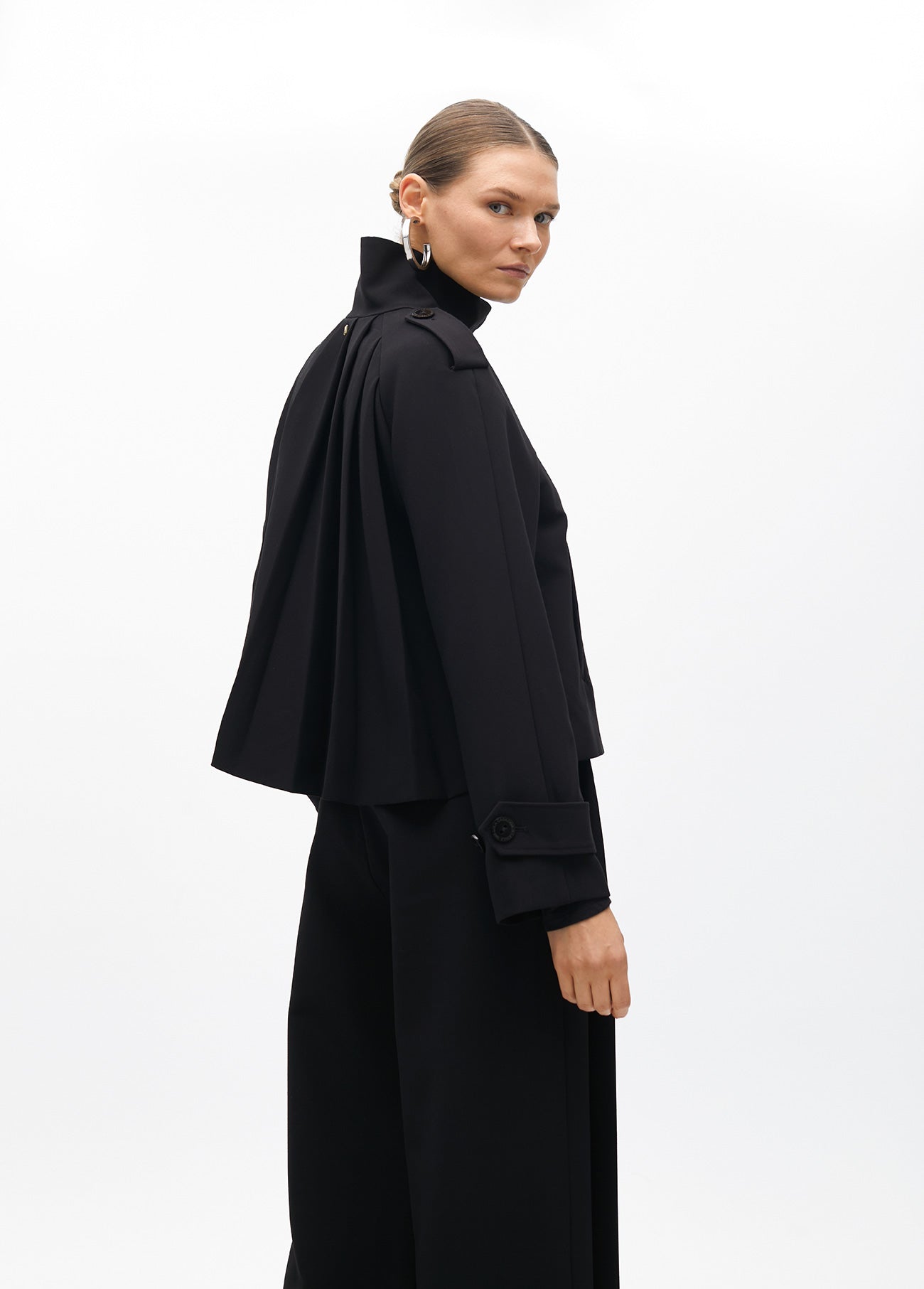 Short jacket with pleated detail on the back