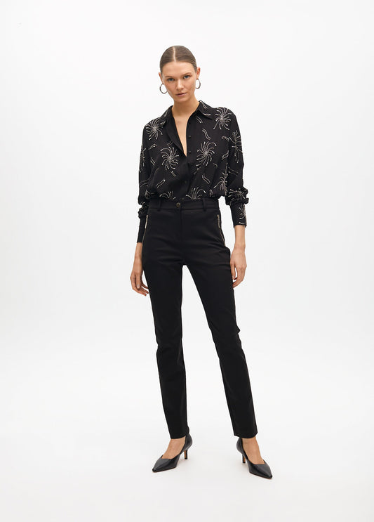 Stretch fabric trousers with zipped pocket