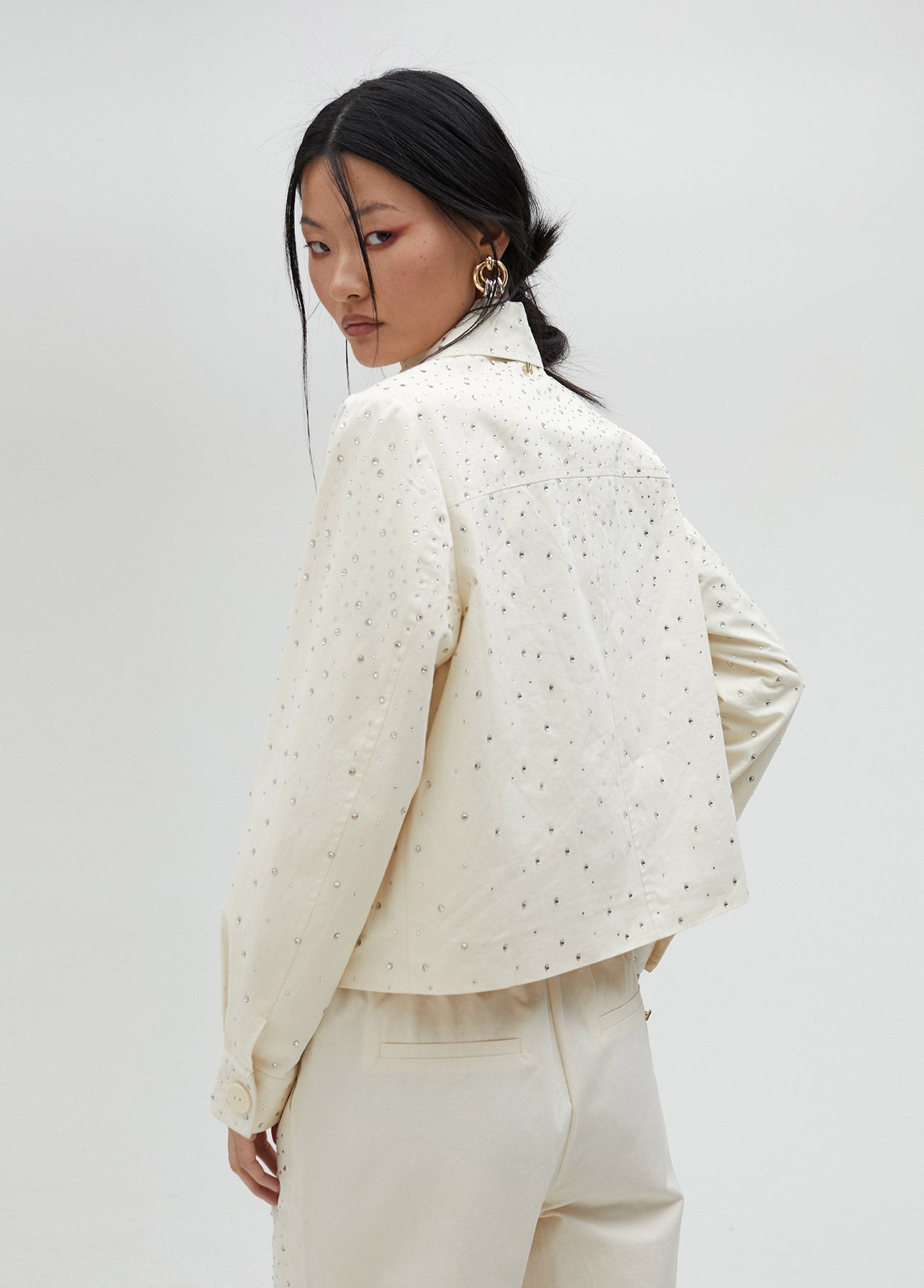 Denim jacket with rhinestone detail