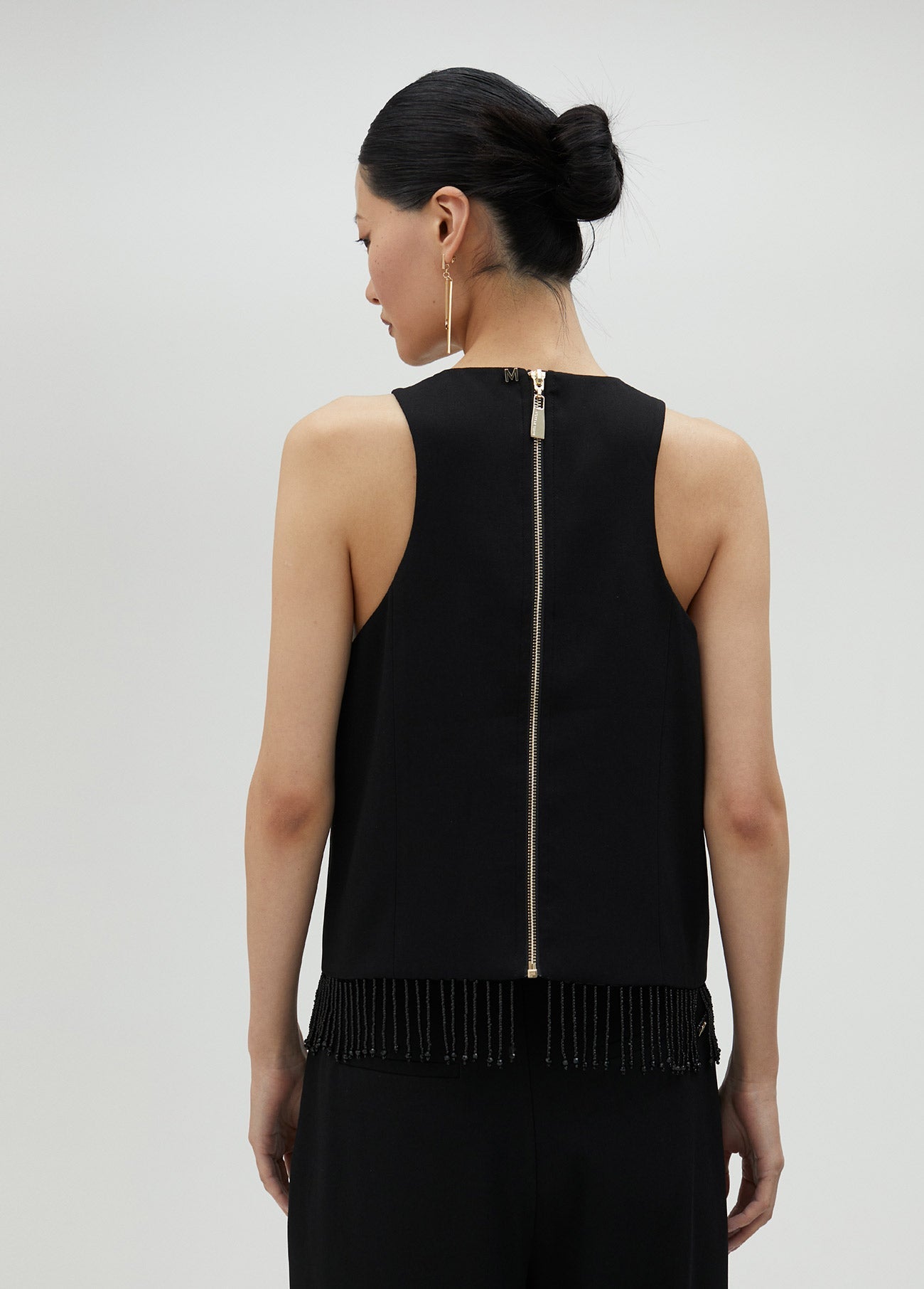Top with fringing and rhinestones